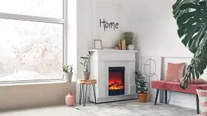 Bright living room with white walls and fireplace showing how interior paint holds up in winter conditions