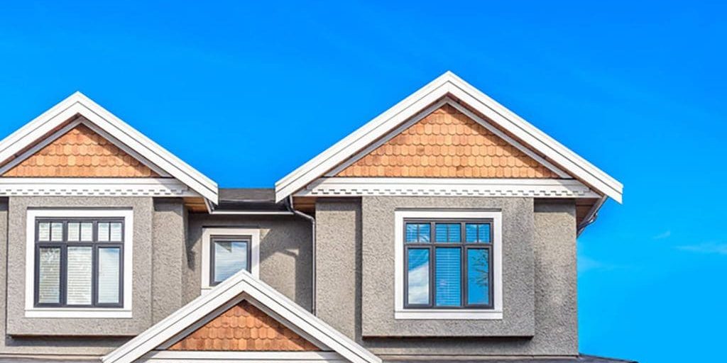 Exterior home with fresh siding and trim, illustrating when to book exterior painting in Rochester Hills for ideal weather conditions